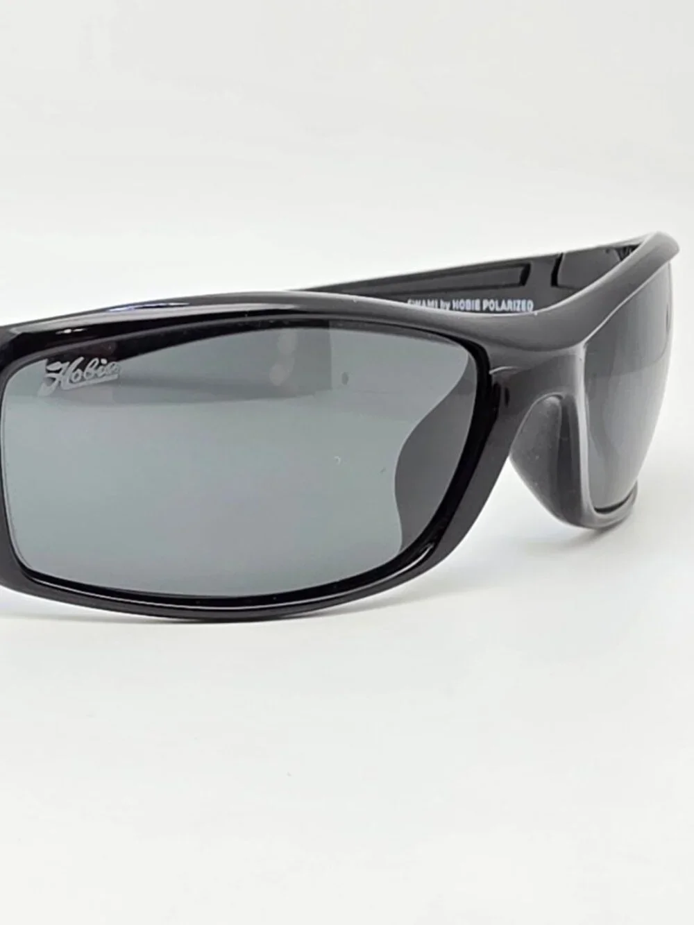 Hobie Motion Collection Swami Black Frame Polarized Grey Lens Sunglasses 60mm